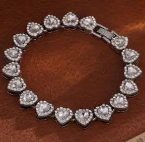 DÚO CORAZÓN RESPLANDECIENTE (COLLAR + PULSERA GRATIS)